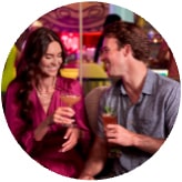 Man and Woman Sharing Drink